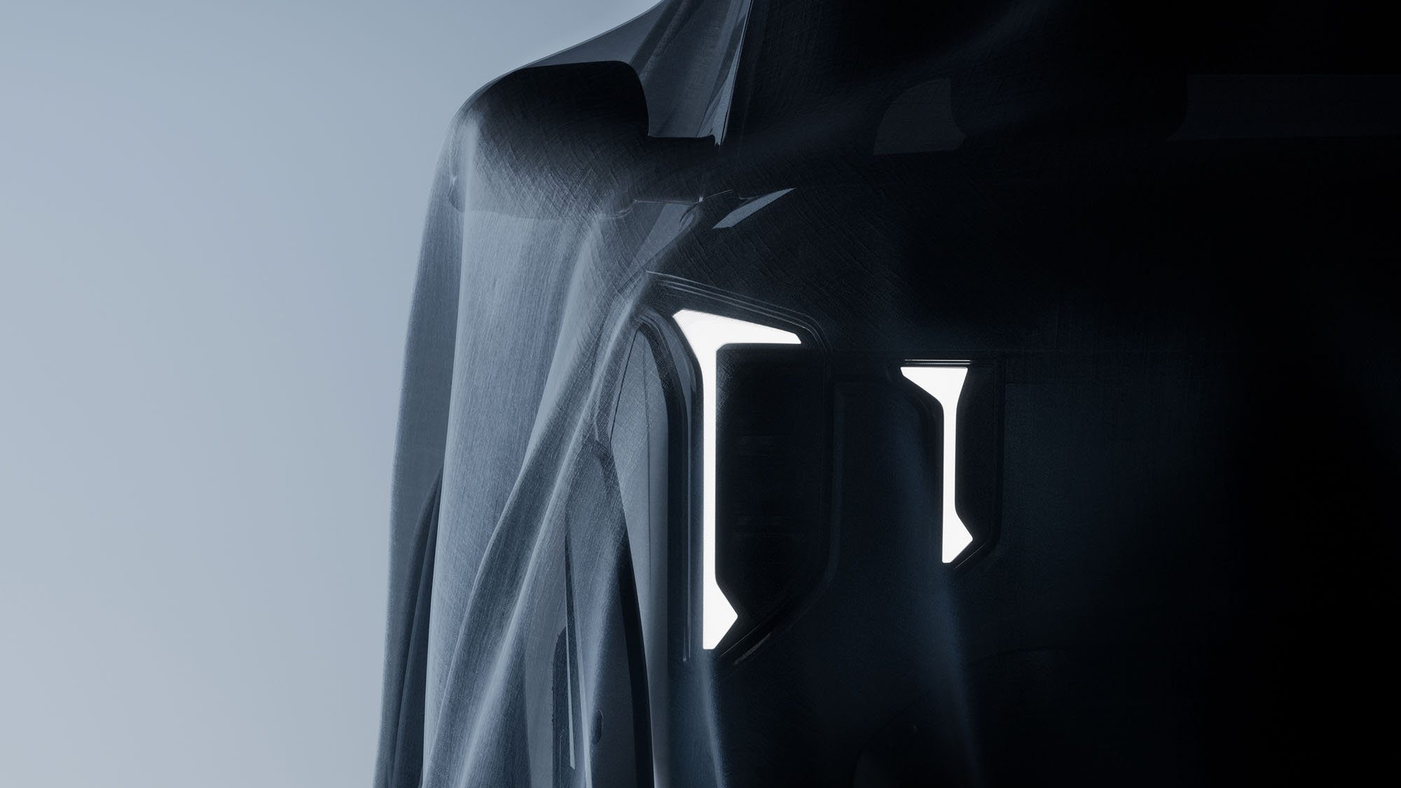 Teaserbild der Front und Lichtsignatur vom verhüllten Kia EV2